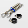 A close-up view of an automatic car trunk lid lifter spring with a silver metal body and blue accents.