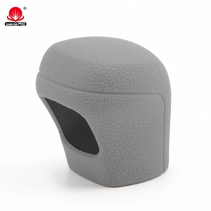 A gray universal car gear shift knob cover with a cutout for the knob.