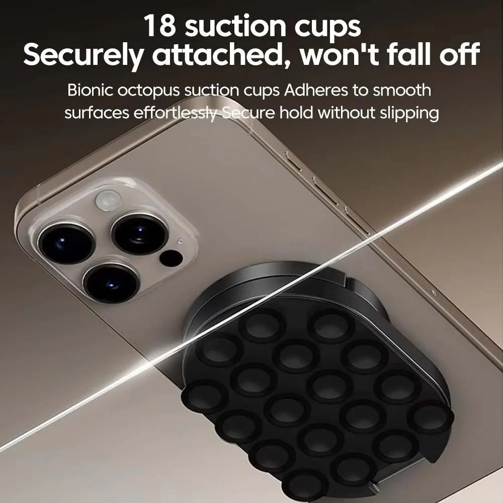 A close-up view of a magnetic suction cup phone holder attached to the back of a smartphone.