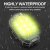 A clear, rectangular strobe warning light is shown glowing brightly against a dark background with water droplets.