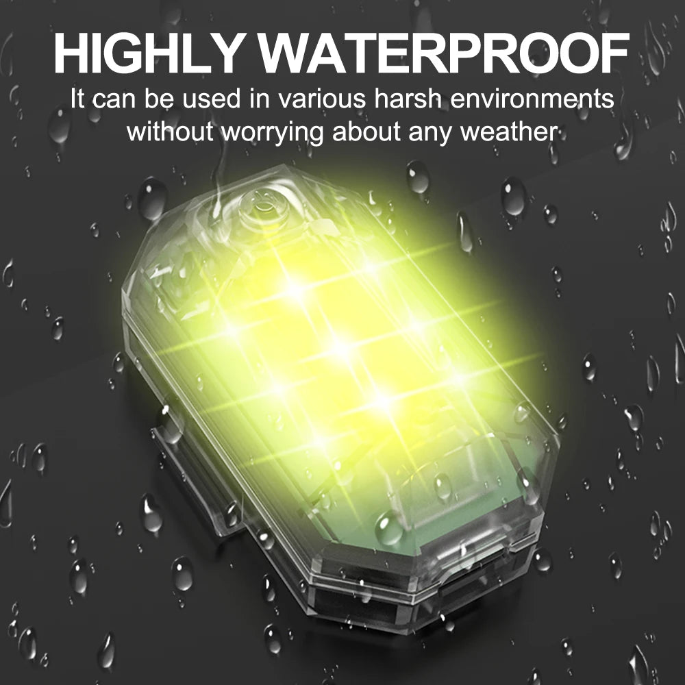 A clear, rectangular strobe warning light is shown glowing brightly against a dark background with water droplets.