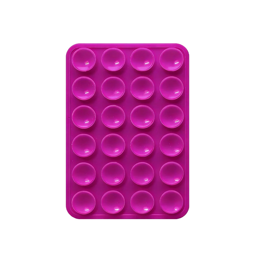 Rosa Silikondichtungs-Handyhalter mit mehreren runden Löchern zum Befestigen von Geräten.