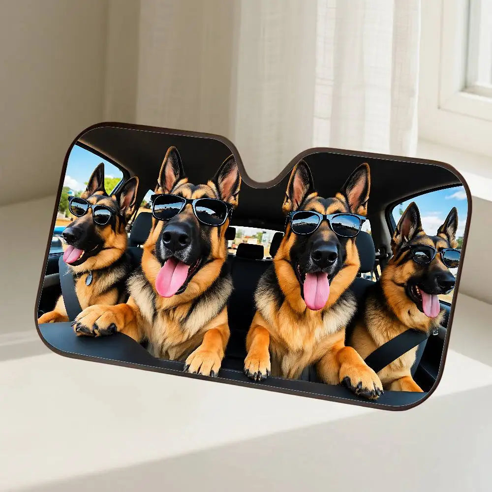 A black car windshield sunshade featuring four happy German Shepherd dogs wearing sunglasses.