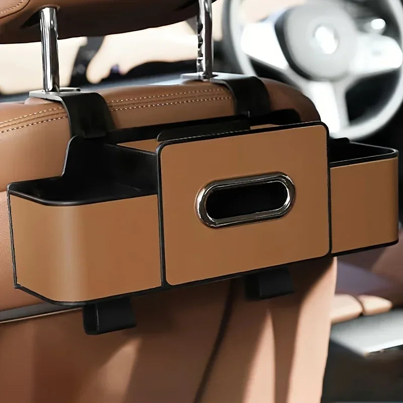 A brown car back seat organizer with a cup holder mounted on the seatback.