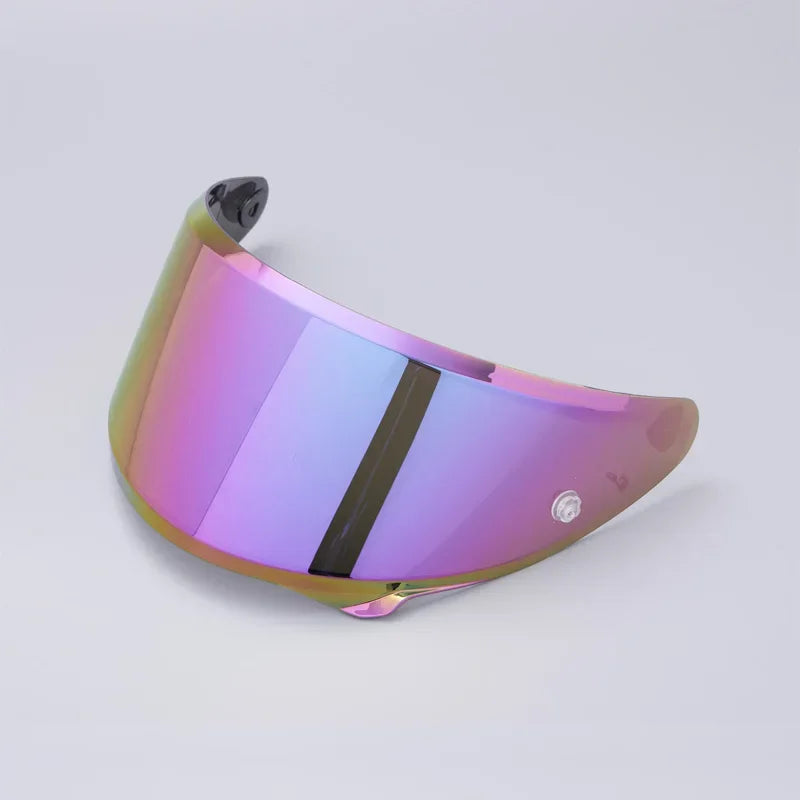 A purple anti-fog visor designed for motorcycle helmets, shown in a slight angle.