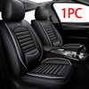 One piece of black leather car seat covers for SUVs and sedans shown in a vehicle interior.