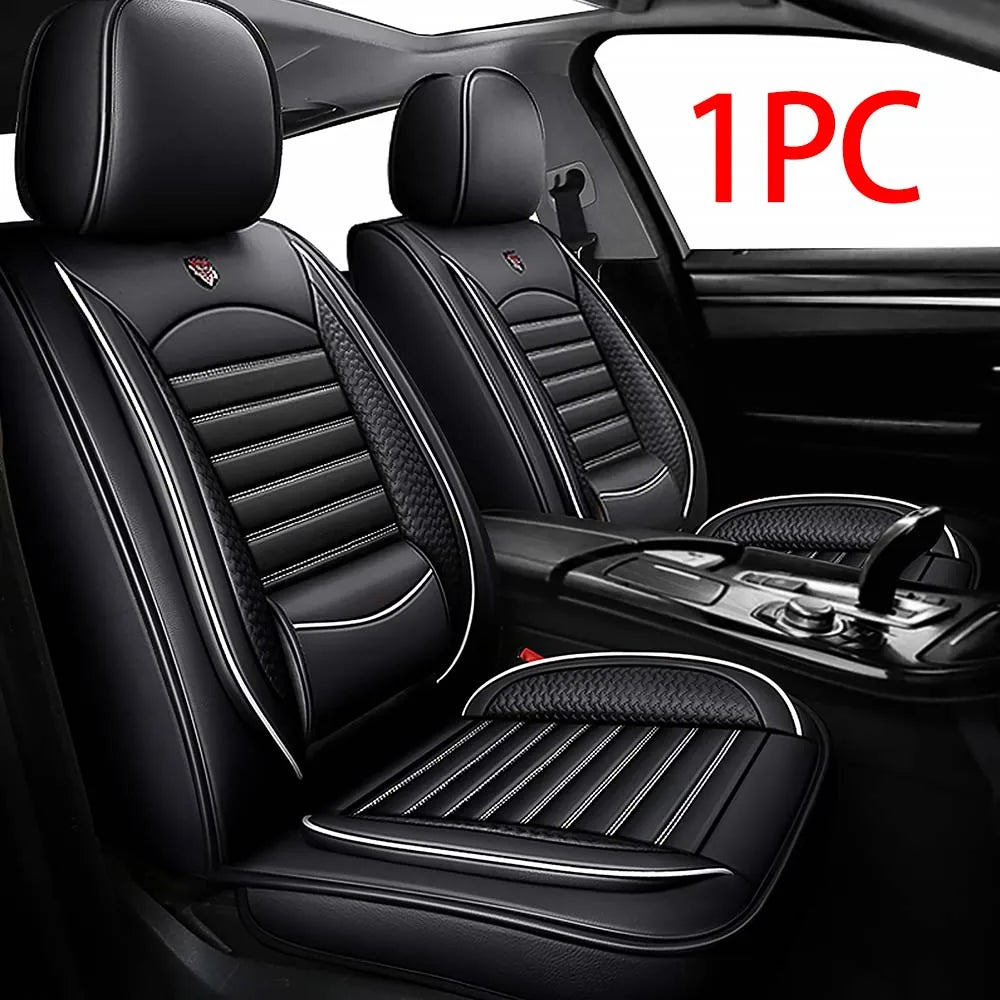 One piece of black leather car seat covers for SUVs and sedans shown in a vehicle interior.