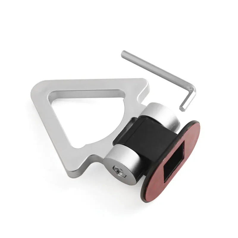 A silver car trailer hook decal set featuring a metal frame and a reddish-brown rectangular piece.