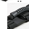 Close-up of a black durable Oxford roll bar grab handle with textured grip and nylon webbing.