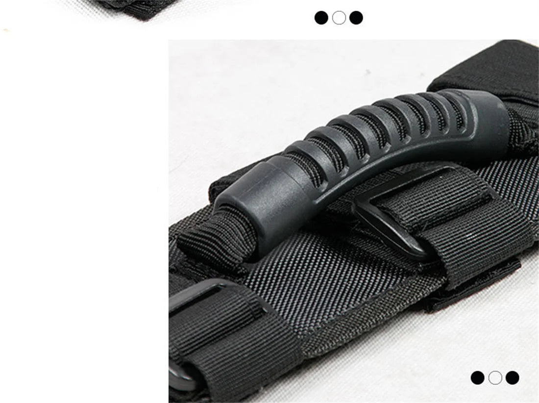 Close-up of a black durable Oxford roll bar grab handle with textured grip and nylon webbing.