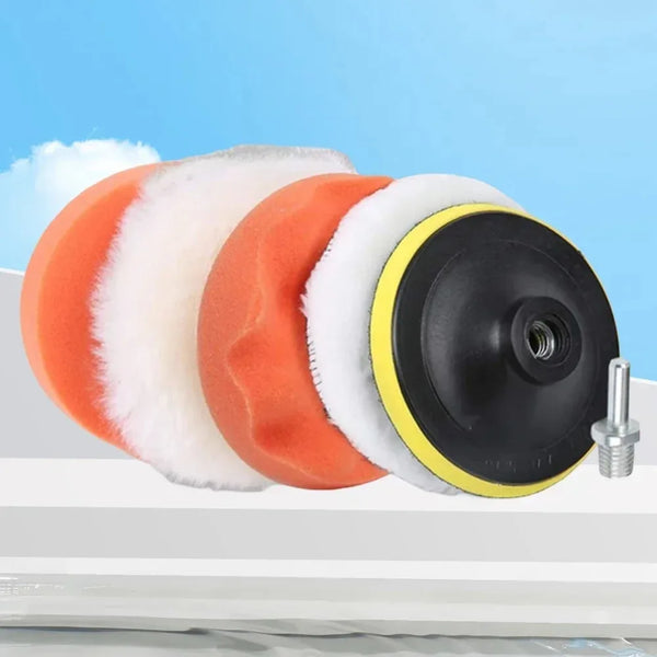 A professional car polishing pad kit showing various colored foam pads and a black spinning pad.