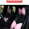 Butterfly-shaped ice silk headrest lumbar support pillow with a pink bow design installed in a car seat.
