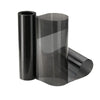 Roll of dark gray automotive tint film for headlights and taillights
