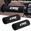 Black DS 900 motorcycle grips shown in close-up with a handlebar and separate grip covers.