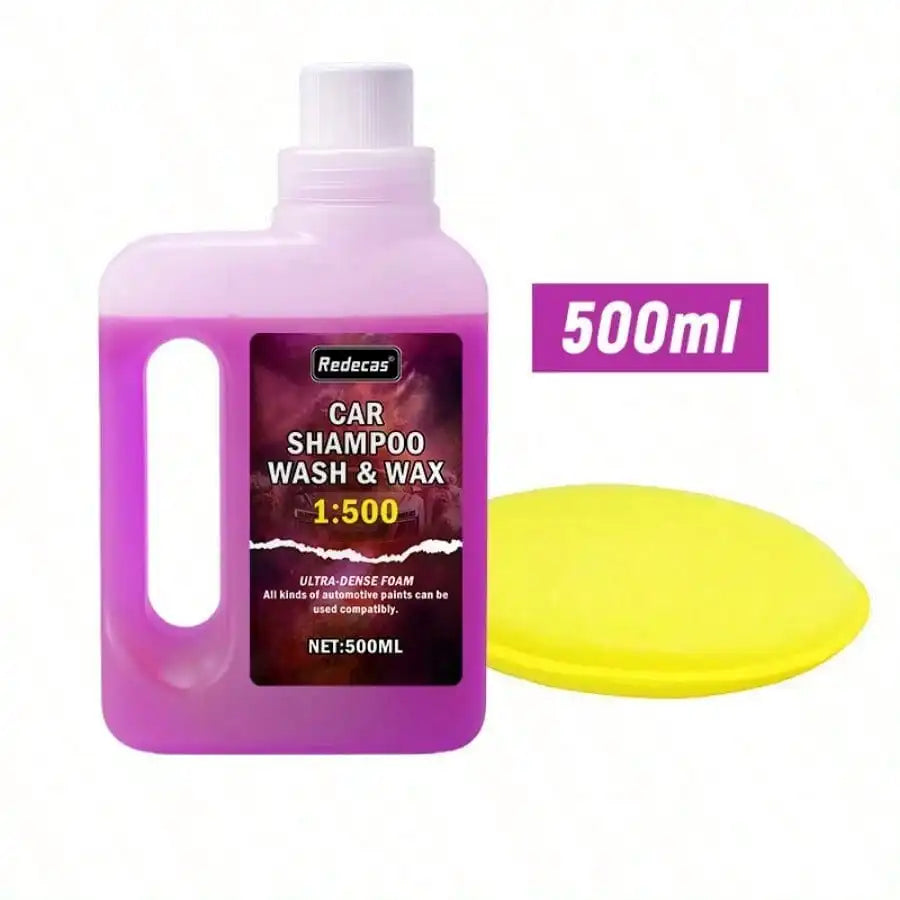 A purple bottle of Redecas Car Shampoo Wash & Wax with a yellow cap and a yellow foam disc shown next to it.