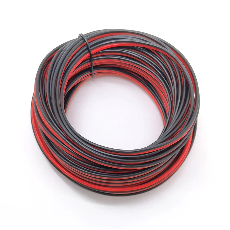 A coil of black and red insulated electrical extension wire with a copper core.