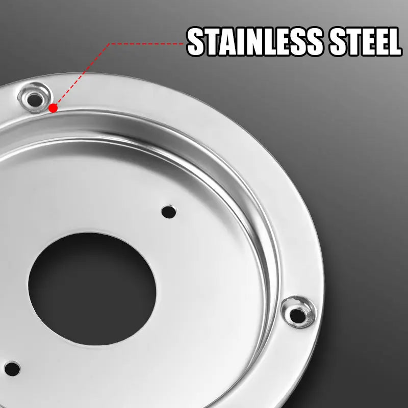 A close-up view of a round stainless steel tail light bezel mount for trailers and vans.