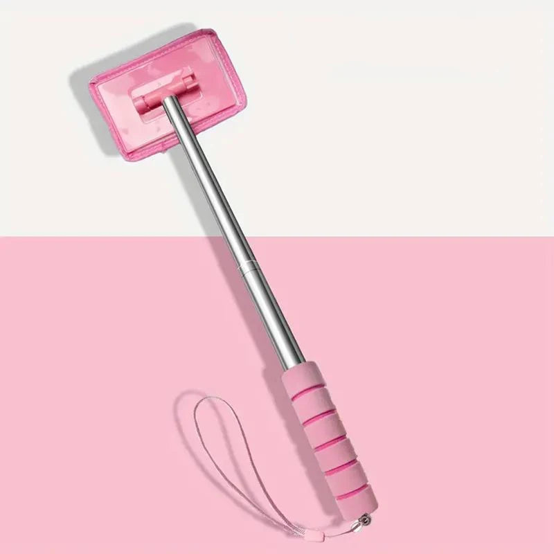 A pink telescopic windshield cleaning brush with a pink holder and a flexible cleaning cord.