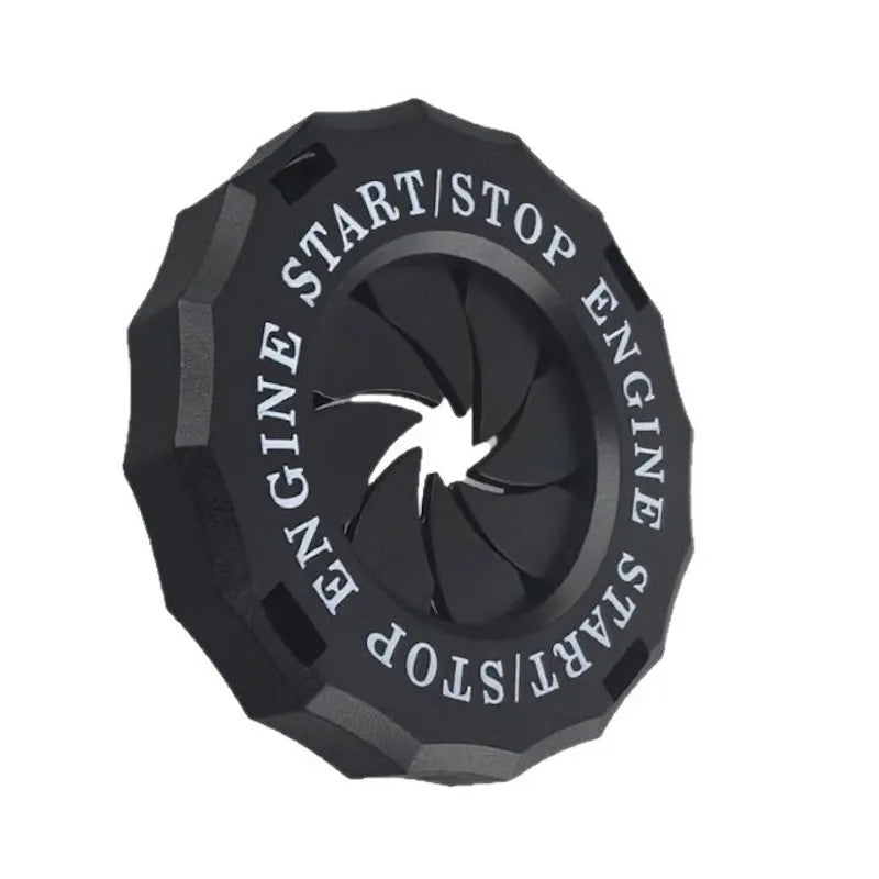 Black decorative ignition cover for an engine start button with engraved text