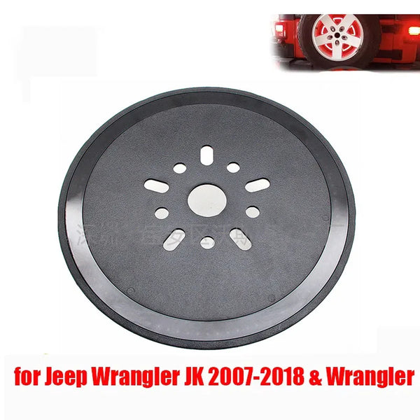 A circular, dark gray third brake light assembly for Jeep Wrangler models.