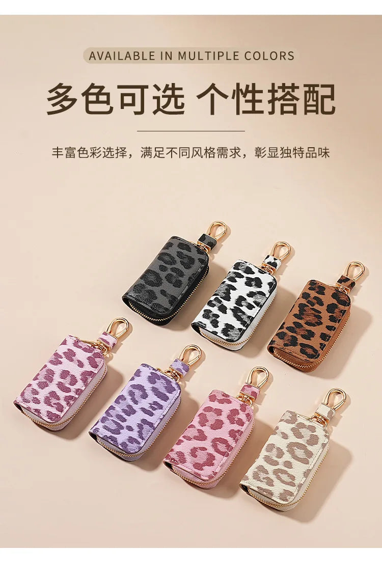Multiple leopard print car key holders in various colors displayed on a light background.
