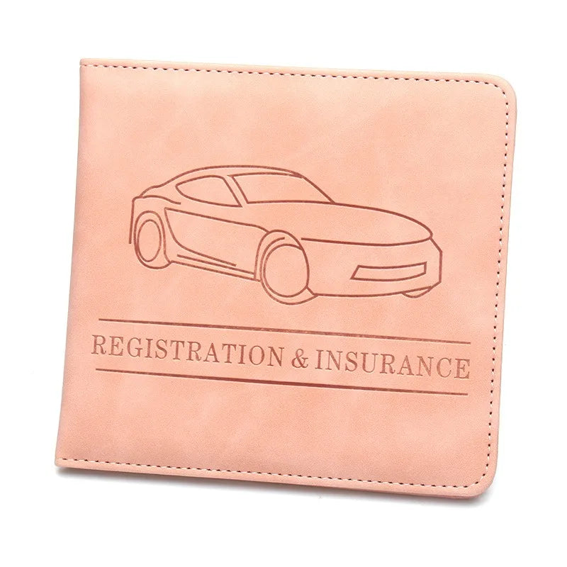 A light peach leather card holder featuring a line drawing of a car and the text Registration & Insurance.