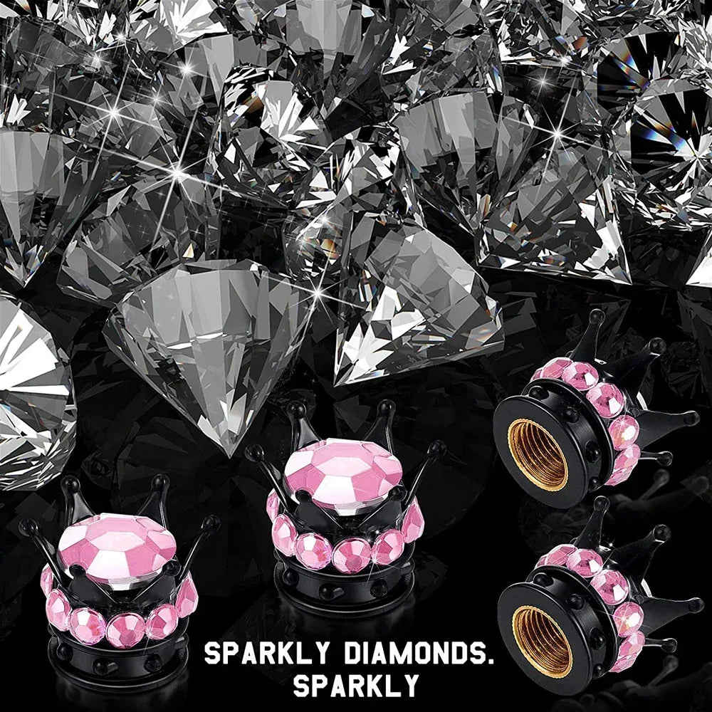 A set of sparkly diamond rhinestone tire valve caps in pink and black.