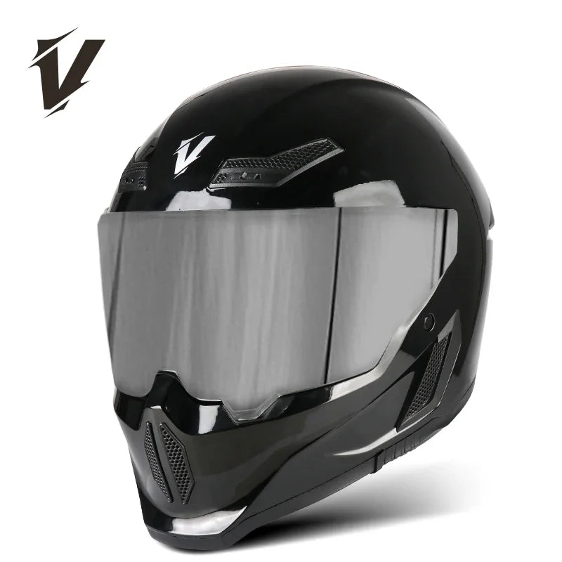 Casco de motocicleta negro DOT aprobado con visor transparente, visto desde el frente.