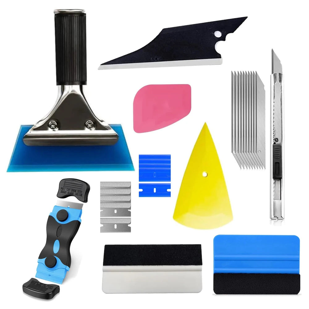 A collection of professional car window tinting tools including a blade, scraper, and various plastic and metal tools.