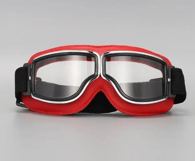 A pair of red retro folding motorcycle windproof glasses with silver frames displayed on a gray background.