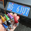 A hand holds various colored M6 license plate screws and bolts, including aluminum alloy and stainless steel options.