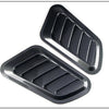 Black decorative air intake vent for a car hood
