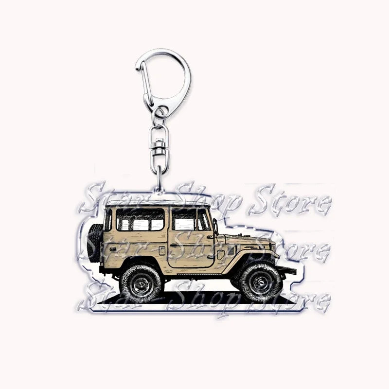 Silver acrylic keychain featuring a beige off-road truck model.