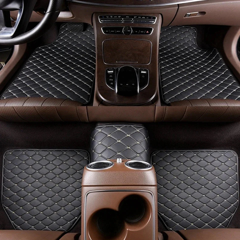 Interior view of a car showing dark brown quilted floor mats and leather trim.