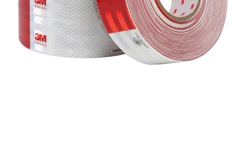 Roll of 3M high-visibility reflective decal tape in red and white, showing the spiral packaging.