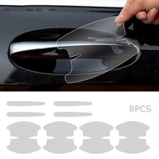 A hand applies a clear scratch-proof film to a car door handle, shown alongside eight pieces of the protection film.