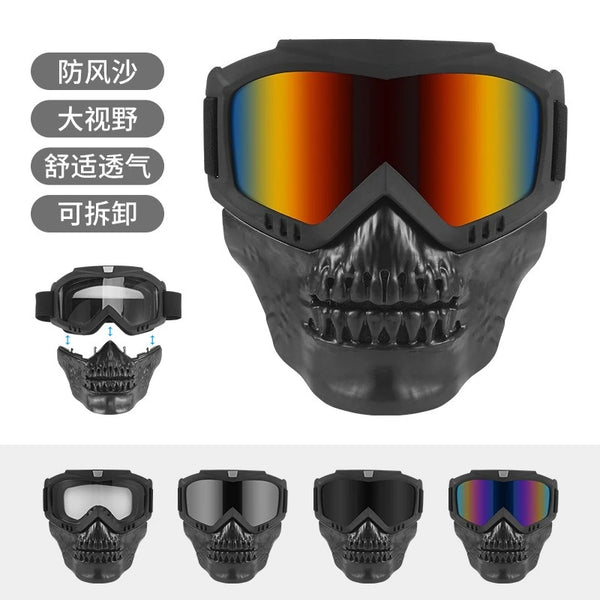 A black protective mask with orange-tinted goggles and a textured face design shown in multiple views.