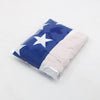 A navy blue and white patriotic windproof car hood cover is shown packaged in clear plastic.
