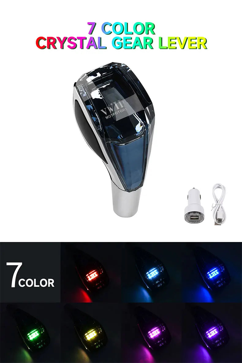 A close-up view of a crystal gear lever with seven different colored LED lights.