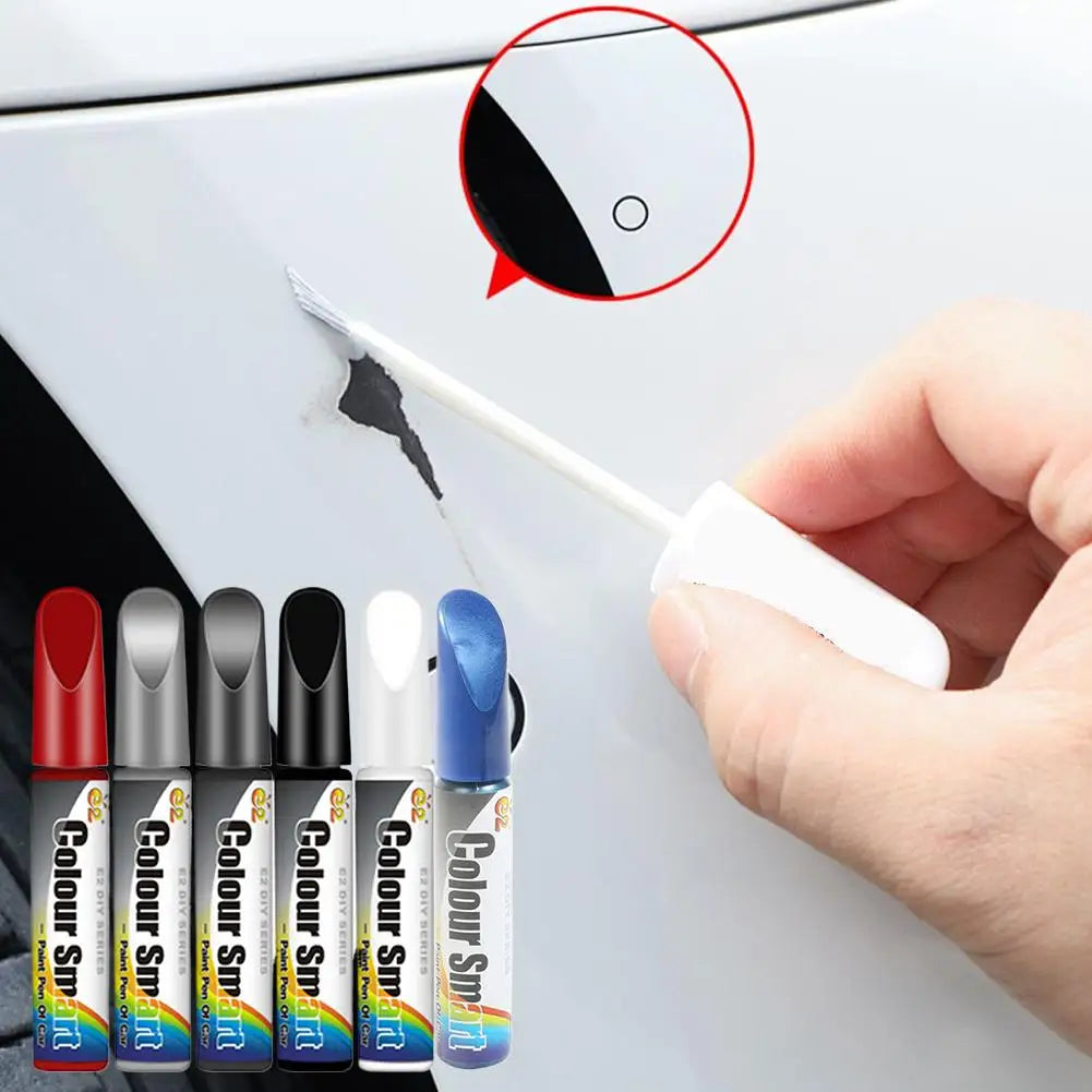 A hand uses a silver pen to repair a scratch on a white surface, demonstrating the Car Scratch Repair Pen.
