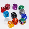 A collection of colorful aluminum dice valve caps arranged in a circle.
