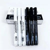 A set of black and white permanent paint markers for art, craft, and DIY