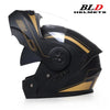 Black motorcycle helmet with gold accents and a clear visor, featuring the BLD HELMETS logo.