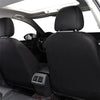 Black universal PU leather car seat covers installed in a vehicle interior.