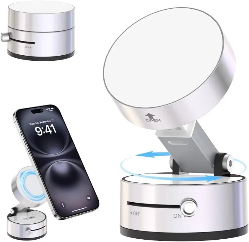 A heavy duty magnetic phone holder with a silver base and a circular transparent lens top, shown next to a smartphone.
