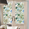 Decorative PVC stained glass window film in a vertical panel set within a white door frame.