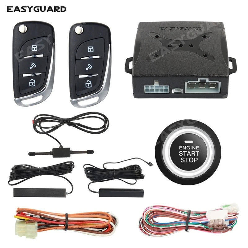 A set of remote engine start and keyless entry car alarm system components including a fob, battery, and wiring harness.