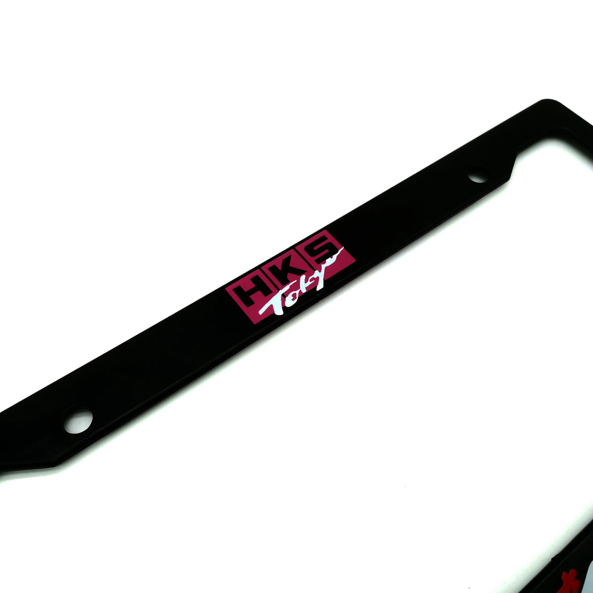Black license plate frame decoration with HKS Tokyo branding