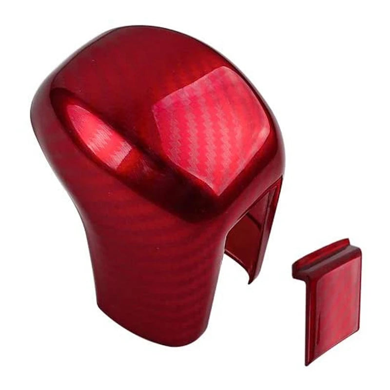 A glossy red carbon fiber gear shifting knob cover for a Honda Civic.