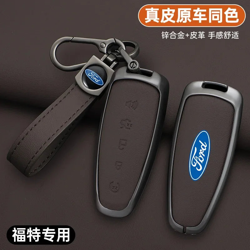 A set of Ford car key covers made of zinc alloy and leather in a brown color shown against a dark background.